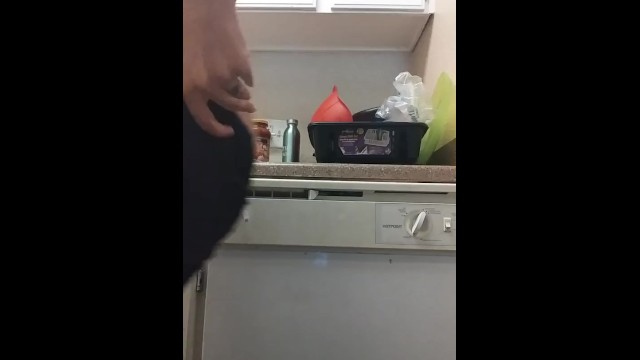 Booty popping in kitchen while cooking