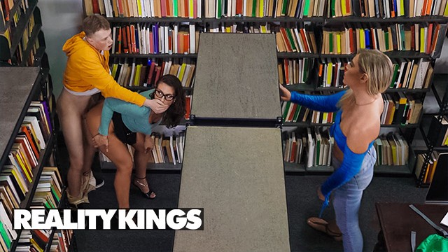 REALITY KINGS - Hot Librarian Mandy Waters Fucks Jimmy Michaels While His GF Is Reading A Book